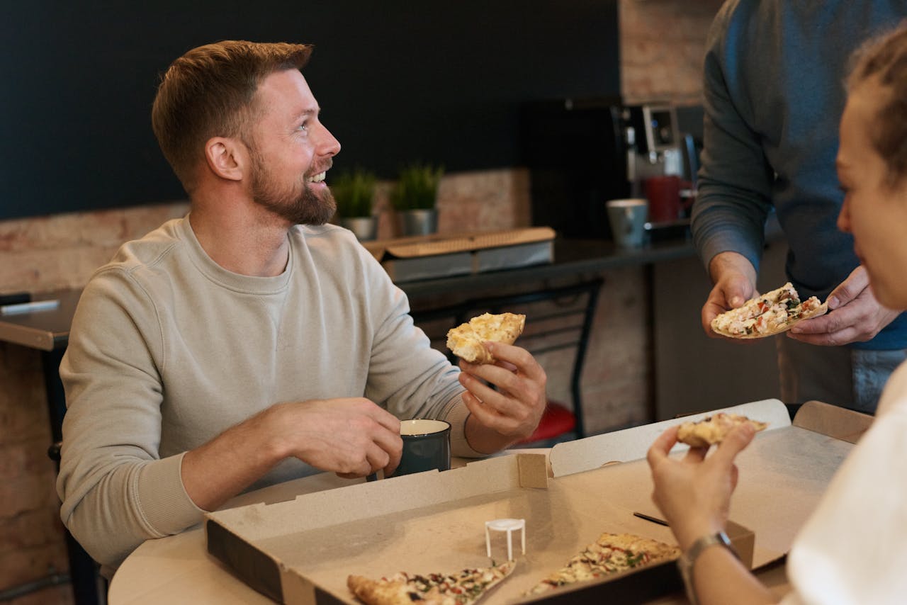 people eating pizza